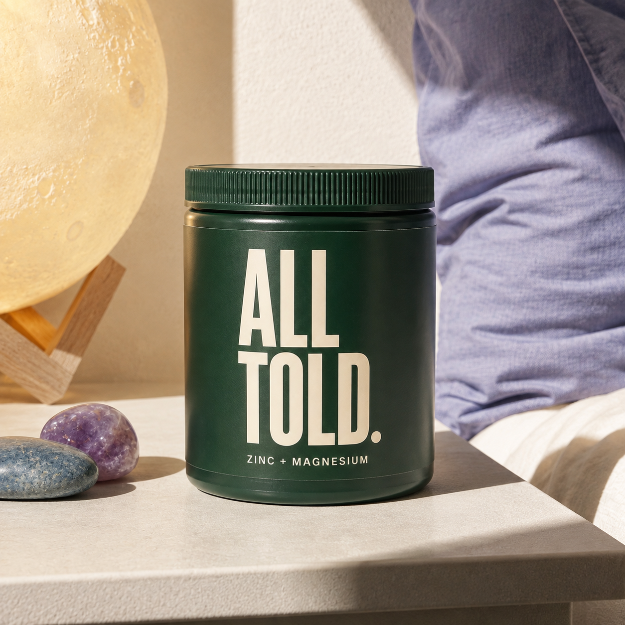 ZINC + MAGNESIUM — ALL TOLD supplement packaging shown in a purpose-led setting
